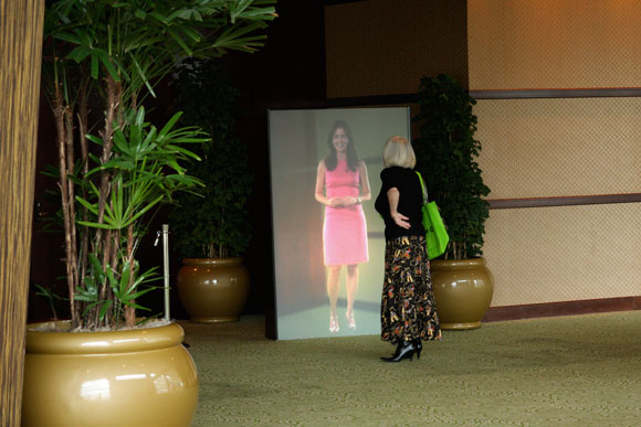 An event visitor examines the Video Monolith.